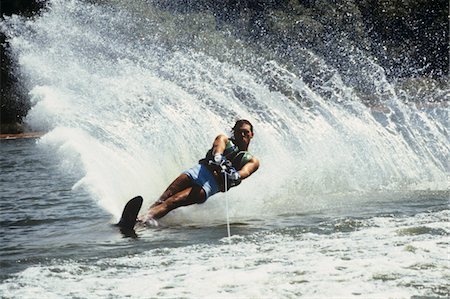 1980s MAN WATERSKIING MAKING FAN OF WATER Stock Photo - Rights-Managed, Code: 846-05646614