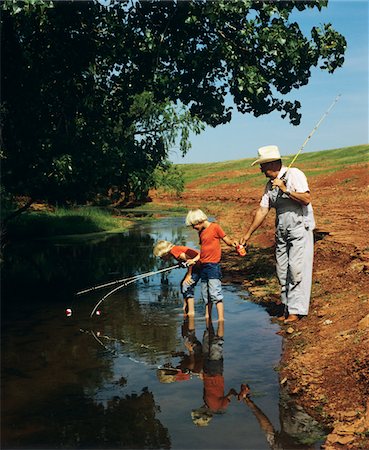 simsearch:846-05647465,k - 1970s - 1980s TWIN BOYS FISHING IN STREAM WITH GRANDFATHER Stock Photo - Rights-Managed, Code: 846-05646613