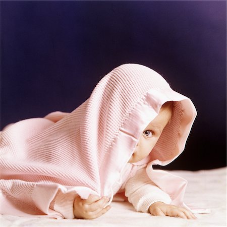 simsearch:846-09012798,k - 1980s BABY PEEKING OUT FROM UNDER BLANKET Stock Photo - Rights-Managed, Code: 846-05646715