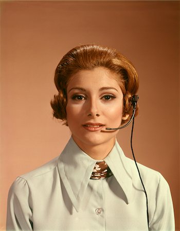 1960s - 1970s PORTRAIT WOMAN TELEPHONE OPERATOR RECEPTIONIST OFFICE WORKER WEARING HEADSET Stock Photo - Rights-Managed, Code: 846-05646961