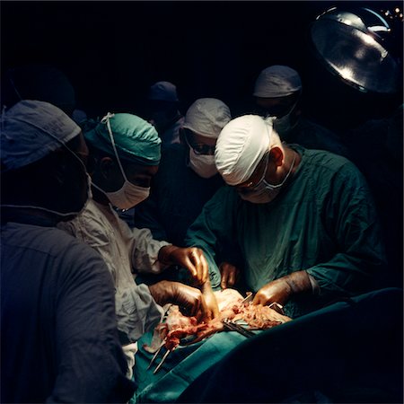 retro hospital - 1960s DOCTORS AND NURSES IN SURGERY OPERATING THEATER PERFORMING MEDICAL PROCEDURE Stock Photo - Rights-Managed, Code: 846-05647196