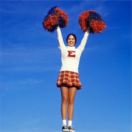 1960s - 1970s TEEN GIRL CHEERLEADER FULL FIGURE HEAD TO TOE SADDLE OXFORD SHOES PLAID SHORT SKIRT POMPOMS Y STANCE ARMS UP Stock Photo - Rights-Managed, Code: 846-05647404