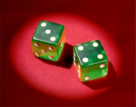 1960s LUCKY 7 GREEN DICE SHOWING NUMBER 4 FOUR AND 3 THREE SYMBOLIC WINNER Stock Photo - Rights-Managed, Code: 846-05647456