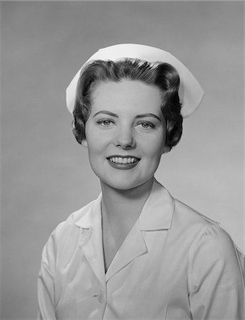 simsearch:846-06112172,k - 1950s PORTRAIT FEMALE NURSE SMILING Stock Photo - Rights-Managed, Code: 846-05647726