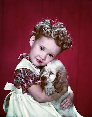 retro child dog - 1940s PORTRAIT GIRL WEARING PLAID DRESS HUGGING COCKER SPANIEL PUPPY Stock Photo - Rights-Managed, Code: 846-05647838