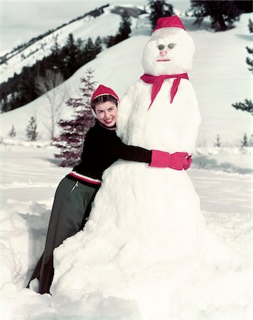 female snowman pictures - 1940s - 1950s SMILING WOMAN HUGGING SNOWMAN Stock Photo - Rights-Managed, Code: 846-05647851