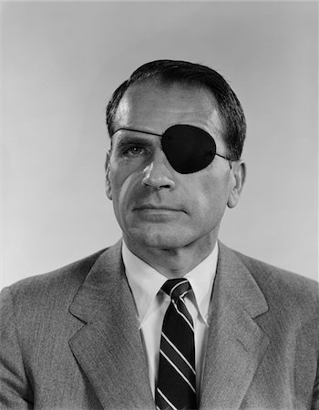 simsearch:846-02796231,k - 1960s PORTRAIT MIDDLE AGED MAN WEARING BLACK PATCH ON LEFT EYE SERIOUS FACIAL EXPRESSION Stock Photo - Rights-Managed, Code: 846-05647922