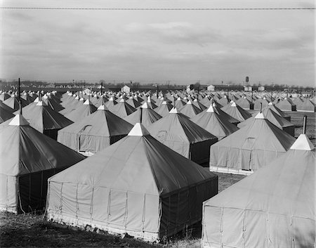 simsearch:846-03164634,k - 1940s TENT CITY MILITARY TRAINING QUARTERS FOR TROOPS WW2 FORT DIX NJ 44TH DIVISION NATIONAL GUARD Stock Photo - Rights-Managed, Code: 846-05647975