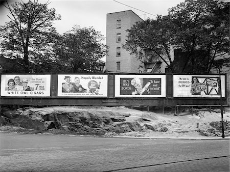 1940s - 1945 WARTIME BILLBOARDS FOR CIGARS BEER COCA COLA ALL PROMOTING WAR BONDS BURNSIDE AVENUE IN THE BRONX NEW YORK Stock Photo - Rights-Managed, Code: 846-05647993