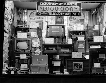 1940s WINDOW OF STORE SELLING RADIOS AND TELEVISIONS ADVERTISING A MILLION DOLLAR SALE Stock Photo - Rights-Managed, Code: 846-05648009