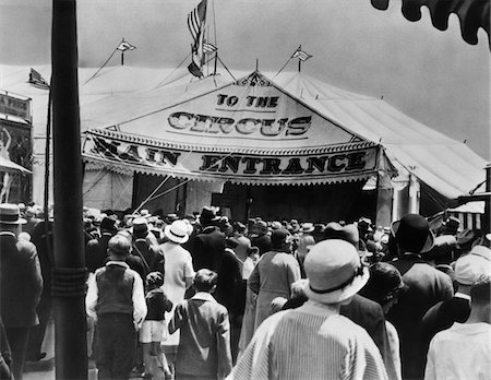 1920s - 1930s BACK VIEW OF CROWDS ENTERING CIRCUS TENT MAIN ENTRANCE Stock Photo - Rights-Managed, Code: 846-05648035
