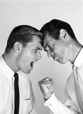 simsearch:846-05648121,k - 1960s PORTRAIT OF 2 BUSINESSMEN HEAD TO HEAD FIGHTING FISTS RAISED Stock Photo - Rights-Managed, Code: 846-05648121