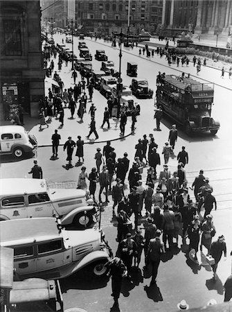 simsearch:846-05646460,k - 1930s PEDESTRIAN CROWD CROSSING INTERSECTION 42nd STREET & 5th AVENUE NYC CARS TAXIS DOUBLE DECKER BUSES STREET AERIAL VIEW Stock Photo - Rights-Managed, Code: 846-05648450