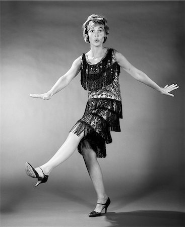 simsearch:846-02794170,k - 1960s WOMAN IN FLAPPER COSTUME DANCING Stock Photo - Rights-Managed, Code: 846-06111849