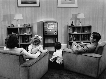 1940s 1950s FAMILY WATCHING TV IN LIVING ROOM Stock Photo - Rights-Managed, Code: 846-06112357