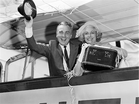 simsearch:846-02797224,k - 1960s ELDER COUPLE HUSBAND AND WIFE SMILING WAVING FROM CRUISE SHIP LOOKING AT CAMERA Stock Photo - Rights-Managed, Code: 846-06112428