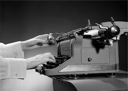 simsearch:846-03166349,k - 1950s WOMAN'S HANDS TYPING AT MANUAL TYPEWRITER ONE HAND ON CARRIAGE RETURN TYPIST SECRETARY OFFICE WORKER WORD PROCESSING Stock Photo - Rights-Managed, Code: 846-06112496