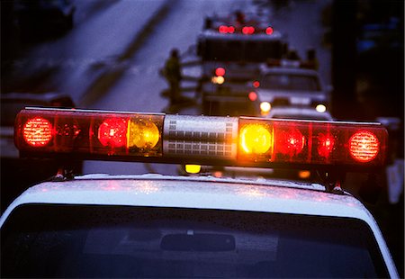 police car with siren - LIGHTS ON TOP OF EMERGENCY VEHICLES AT DUSK Stock Photo - Rights-Managed, Code: 846-07760729