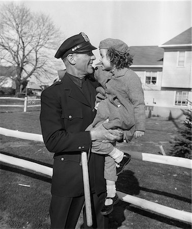 female in law enforcement - 1950s POLICEMAN CARRYING YOUNG GIRL Stock Photo - Rights-Managed, Code: 846-08140100