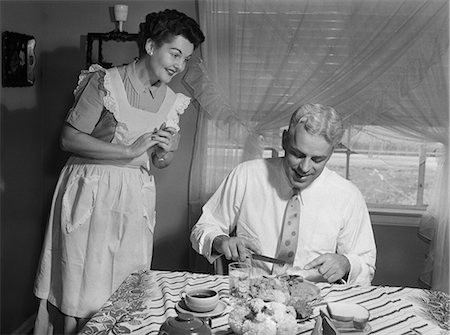 friends women indoors happy middle aged - 1950s HUSBAND EATING DINNER AS WIFE LOOKS ON Stock Photo - Rights-Managed, Code: 846-08512683