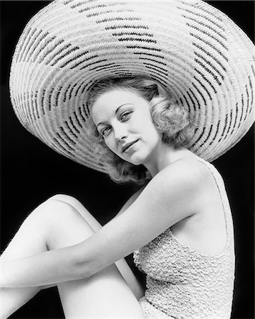 1930s PORTRAIT BLONDE WOMAN WEARING BATHING SUIT LARGE STRIPED STRAW HAT LOOKING AT CAMERA Stock Photo - Rights-Managed, Code: 846-08639481