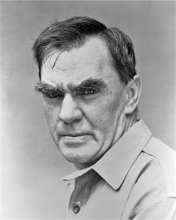 1930s PORTRAIT ANGRY MAN WITH BUSHY EYBEBROWS LOOKING AT CAMERA Stock Photo - Rights-Managed, Code: 846-08639492