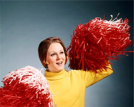 1960s 1970s CHEERLEADER YELLOW TURTLENECK SWEATER RED WHITE POMPOMS CHEERING Stock Photo - Rights-Managed, Code: 846-09013023