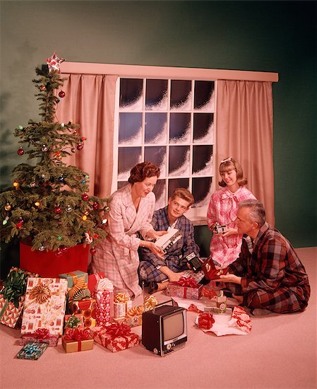 1960s MAN WOMAN MOTHER FATHER TWO TEENAGERS BOY GIRL SON DAUGHTER AROUND CHRISTMAS TREE OPENING PRESENTS Stock Photo - Premium Rights-Managed, Artist: ClassicStock, Image code: 846-09013060