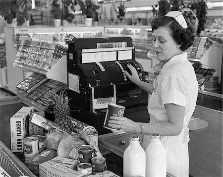simsearch:846-05647292,k - 1950s WOMAN GROCERY SUPERMARKET CASHIER RINGING FOOD PURCHASES Stock Photo - Rights-Managed, Code: 846-09013129