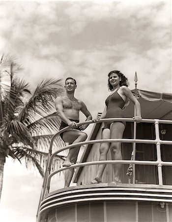 simsearch:846-09013131,k - 1930s 1940s MAN WOMAN COUPLE IN SWIM WEAR BATHING SUITS TROPICAL POOL SIDE VACATION HOTEL MIAMI BEACH FLORIDA USA Foto de stock - Con derechos protegidos, Código: 846-09013120