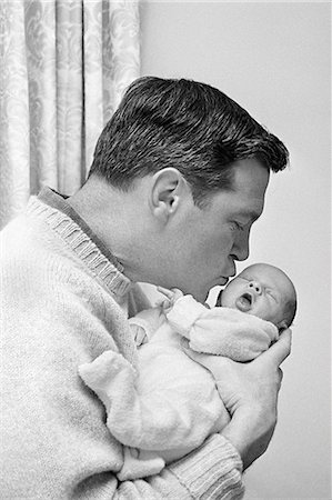 simsearch:846-05646255,k - 1960s FATHER HOLDING AND KISSING HIS INFANT BABY SON Stock Photo - Rights-Managed, Code: 846-09085256