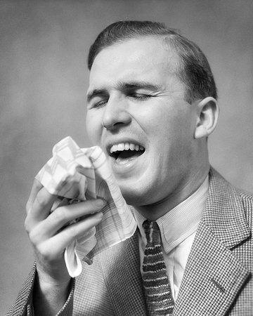 1930s MAN EYES CLOSED MOUTH OPEN HANDKERCHIEF IN HAND ABOUT TO SNEEZE Photographie de stock - Rights-Managed, Code: 846-09181493
