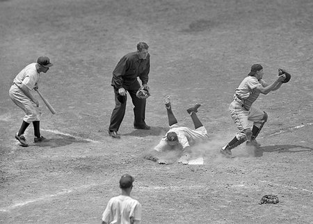 1950S 1960S baseball player safe at home plate cacther in front of plate umpire looking on next batter on deck Stock Photo - Rights-Managed, Code: 846-09181544