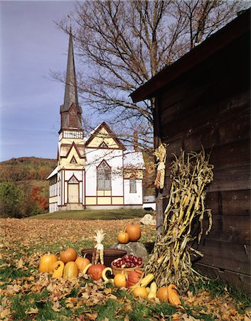 east - 1960s CHURCH IN AUTUMN GOURDS PUMPKINS BASKETS OF APPLES DRIED CORN EAST ORANGE VT NEW ENGLAND SCENIC Stock Photo - Rights-Managed, Code: 846-02794113
