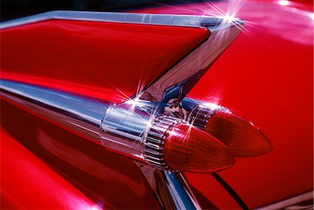 simsearch:846-02794840,k - 1959 CADILLAC SERIES 6200 RED REAR TAIL ROCKET FINS Stock Photo - Rights-Managed, Code: 846-02794627