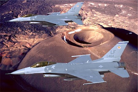 simsearch:846-03163699,k - TWO USAF F-16 FALCONS FLYING OVER CRATER Stock Photo - Rights-Managed, Code: 846-02794648