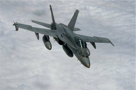 simsearch:846-03163699,k - USAF F 18 A HORNET FLYING OVER CLOUDS Stock Photo - Rights-Managed, Code: 846-02794659