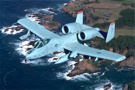 simsearch:846-03163699,k - USAF A-10 THUNDERBOLT FLYING OVER WATER Stock Photo - Rights-Managed, Code: 846-02794651