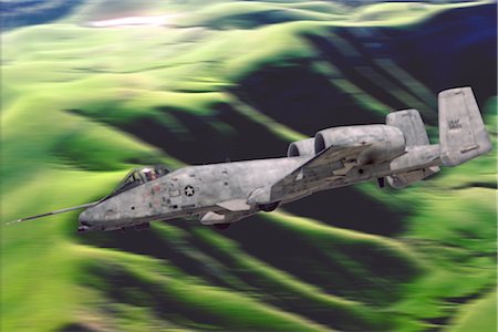 simsearch:846-03163699,k - USAF A-10 WARTHOG FLYING OVER HILLS Stock Photo - Rights-Managed, Code: 846-02794661