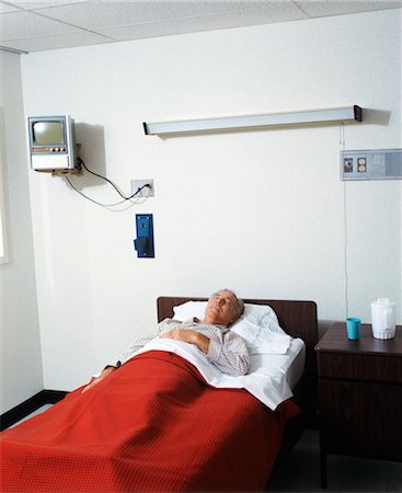 elderly male patient in hospital bed - 1970s SENIOR MAN PATIENT IN HOSPITAL BED Stock Photo - Rights-Managed, Code: 846-02794769