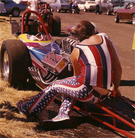retro repair - 1960s 1970s MAN WEARING PATRIOTIC CLOTHES WORKING ON ENGINE OF DRAG RACING CAR Stock Photo - Rights-Managed, Code: 846-02794797