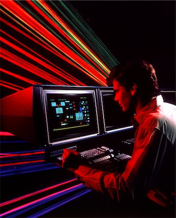 1980s 1990s MAN USING COMPUTER SPECIAL EFFECTS Foto de stock - Con derechos protegidos, Código: 846-02794923