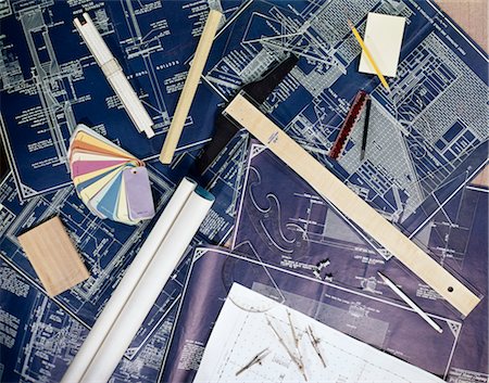 1970s STILL LIFE OF BUILDING BLUEPRINTS SLIDE RULE TEMPLATES COLOR SAMPLES OTHER ARCHITECT BUILDER ITEMS Stock Photo - Rights-Managed, Code: 846-02794936