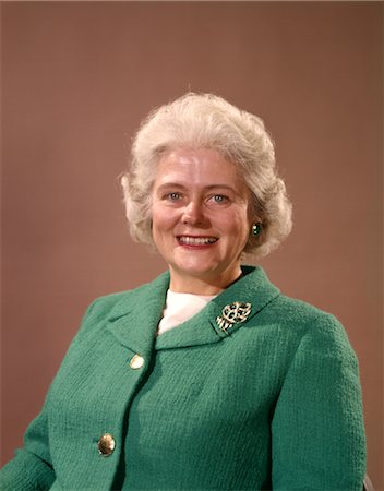 simsearch:846-02794968,k - 1960 1960s SMILING MATURE SENIOR ELDERLY WOMAN SILVER HAIR GREEN WOOL JACKET PIN BROOCH WOMEN SENIORS PORTRAIT Stock Photo - Rights-Managed, Code: 846-02794968