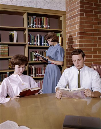 entertainment in the 1960s - 1960s HIGH SCHOOL STUDENTS IN LIBRARY READING AND STUDYING Stock Photo - Rights-Managed, Code: 846-02795115