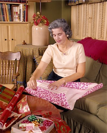 retro woman with christmas - 1960s MIDDLE AGED WOMAN WRAPPING GIFT Stock Photo - Rights-Managed, Code: 846-02795138