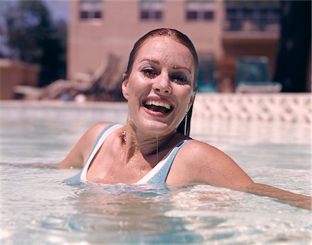 WOMAN LAUGHING IN SWIMMING POOL Stock Photo - Rights-Managed, Code: 846-02795145