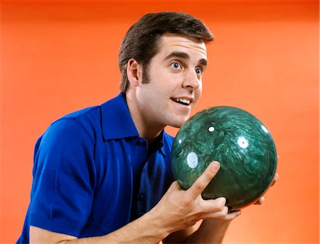 1960s CLOSE-UP OF YOUNG MAN HOLDING BOWLING BALL READY TO BOWL Stock Photo - Rights-Managed, Code: 846-02795180