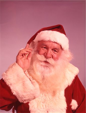 simsearch:846-02797880,k - ANNÉES 1960 PORTRAIT SOURIANT SANTA CLAUS HOLDING UP MAIN Photographie de stock - Rights-Managed, Code: 846-02795294