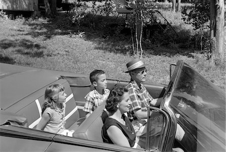 1950s FAMILY OF FOUR RIDING IN CONVERTIBLE TOP DOWN SUMMER OUTDOOR Stock Photo - Rights-Managed, Code: 846-02795485
